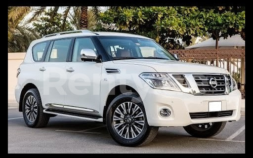 Bright White Nissan Patrol for rent in Dubai