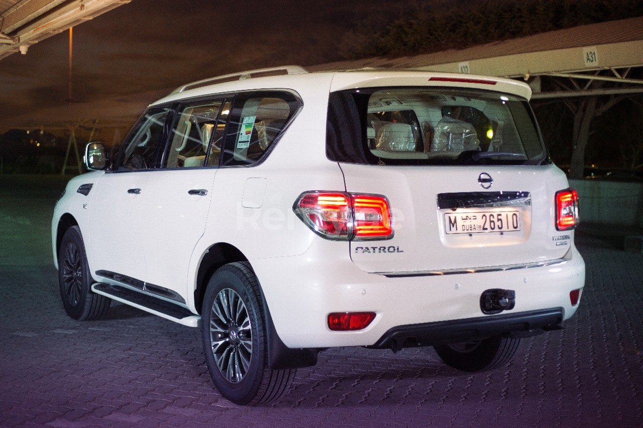 Bright White Nissan Patrol for rent in Dubai 3