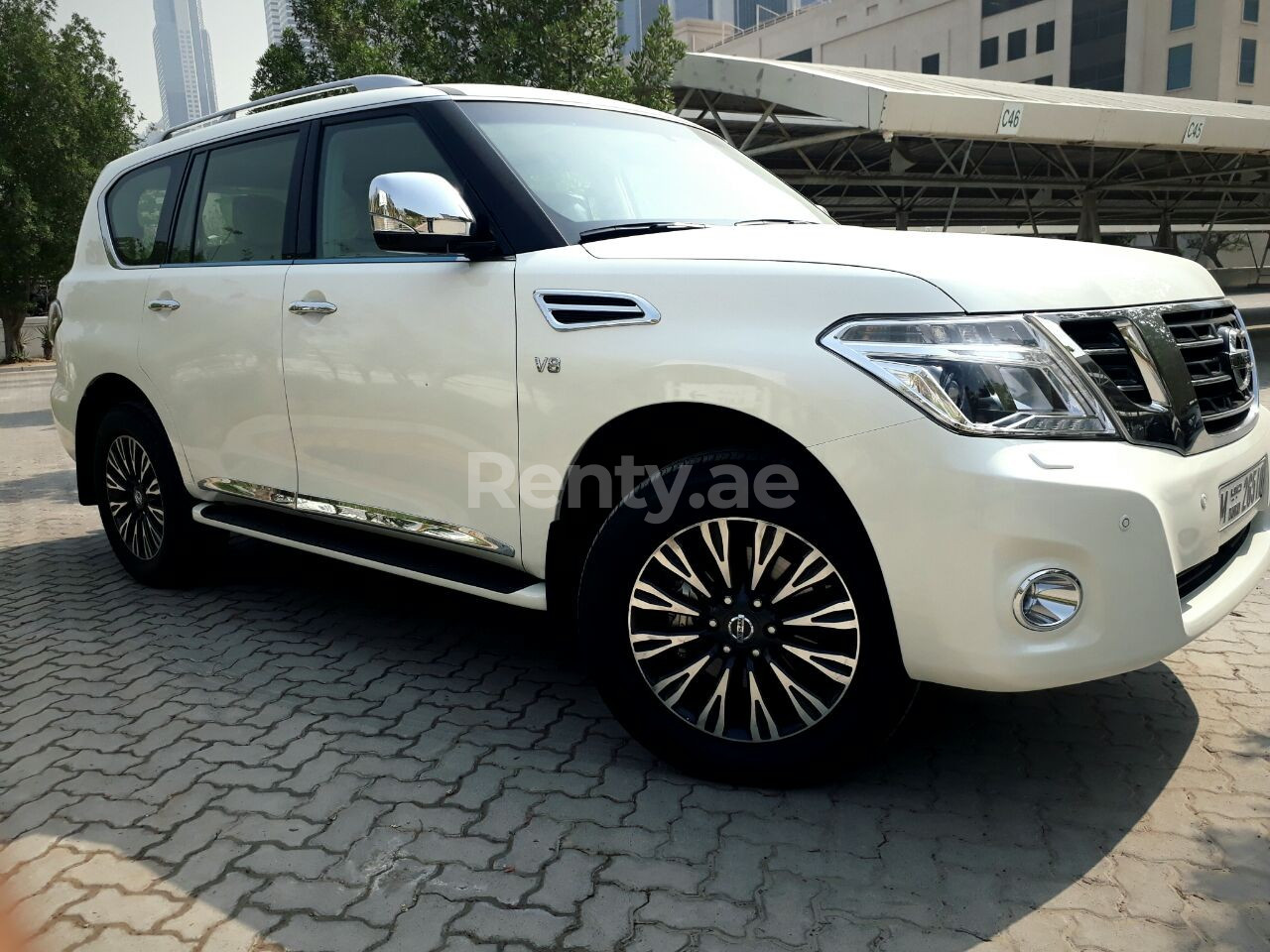 Bright White Nissan Patrol for rent in Abu-Dhabi 7