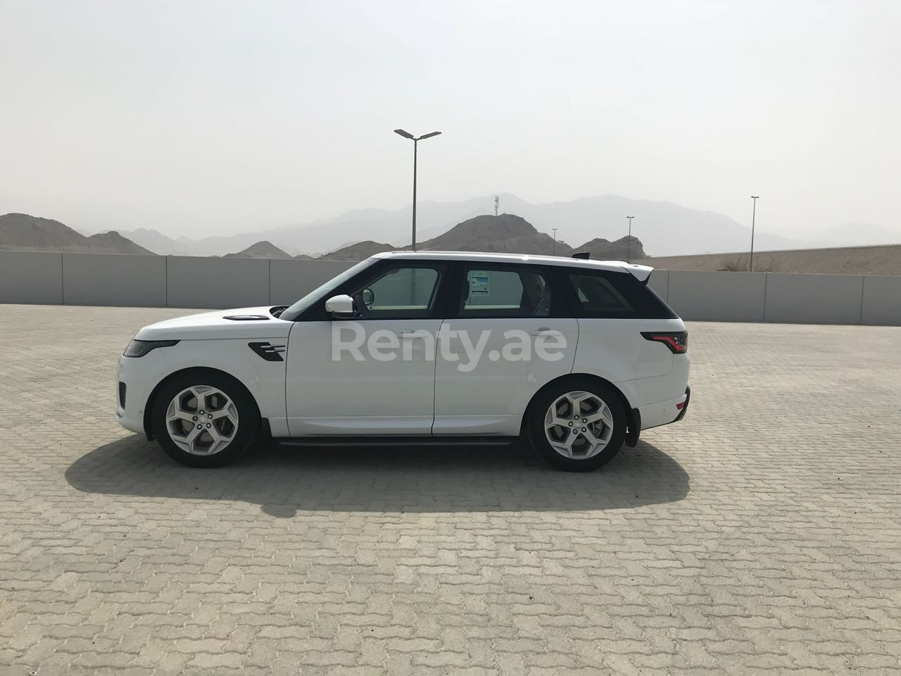 White Range Rover Sport for rent in Sharjah 6