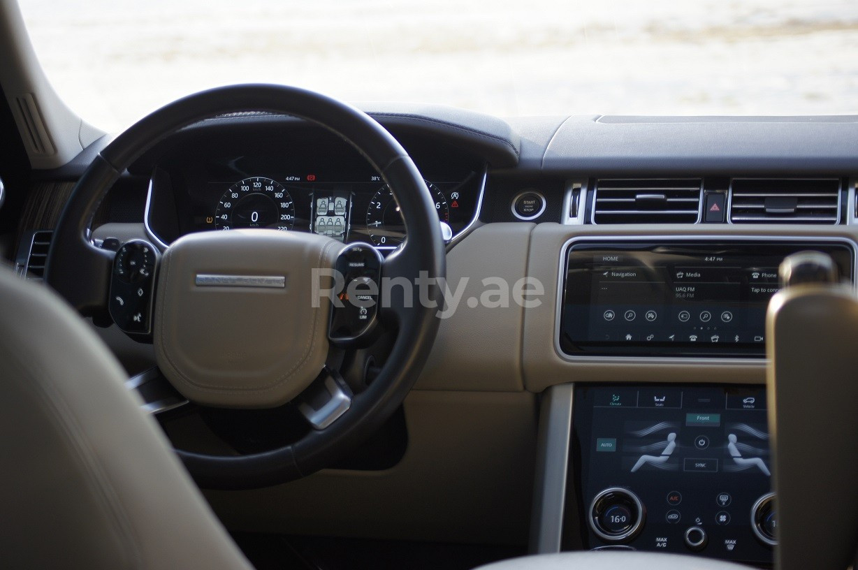 White Range Rover Vogue for rent in Abu-Dhabi 4