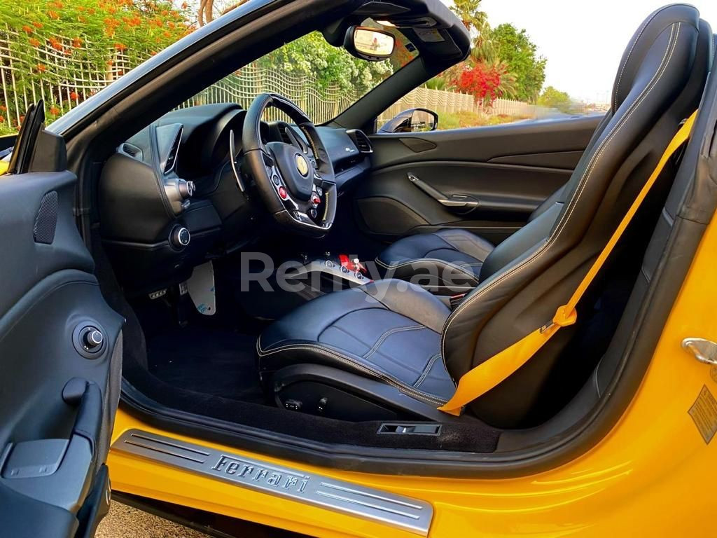 Yellow Ferrari 488 Spyder for rent in Sharjah 4