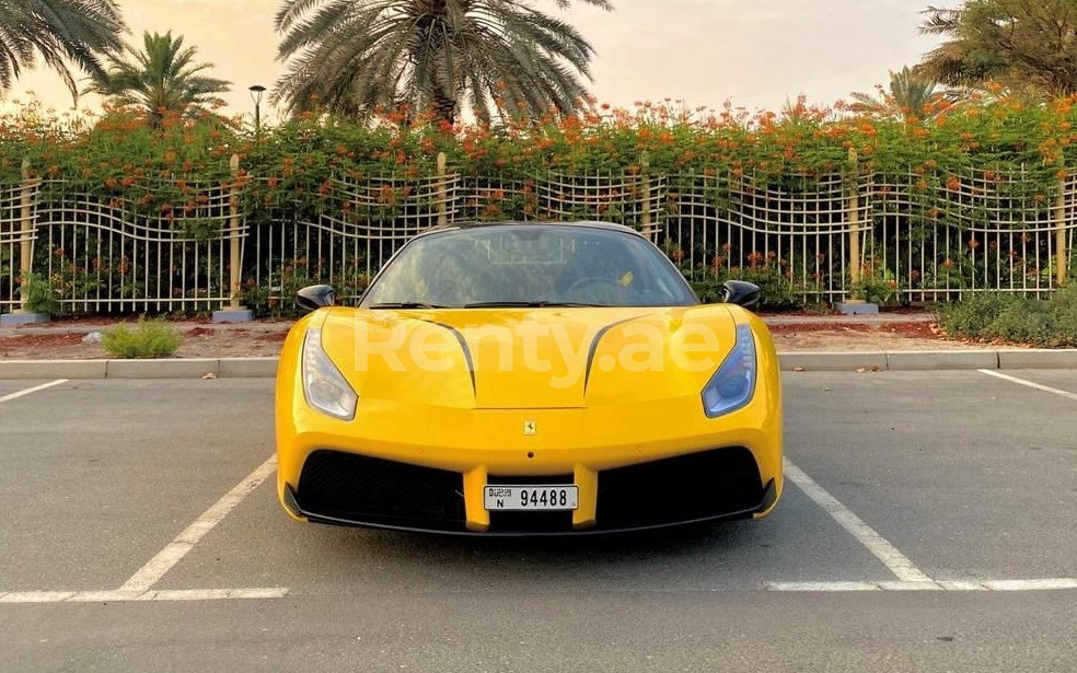 Yellow Ferrari 488 Spyder for rent in Dubai