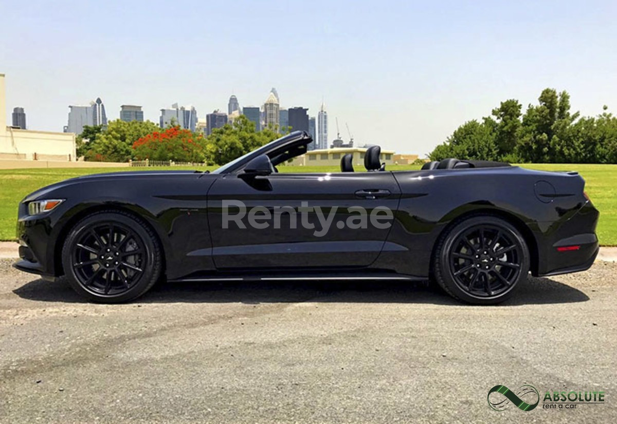 Black Ford Mustang for rent in Abu-Dhabi 1