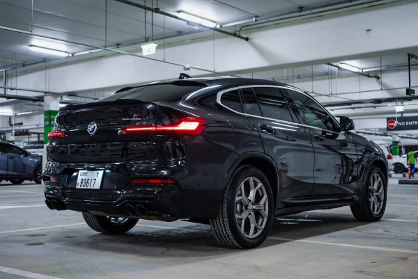  Black 2020 BMW X4 with X4M Body Kit Photo 2