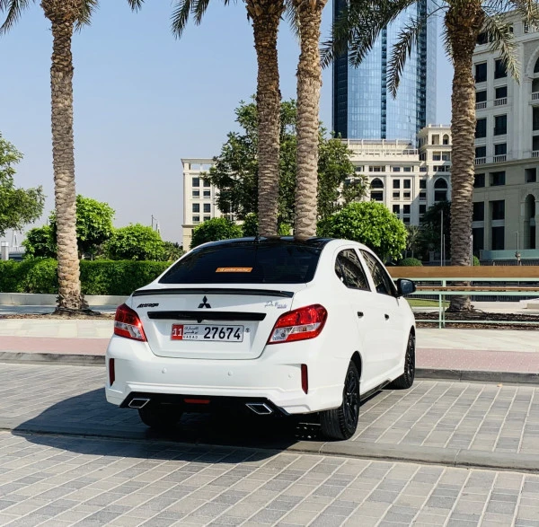  White Mitsubishi Attrage Prime Photo 2