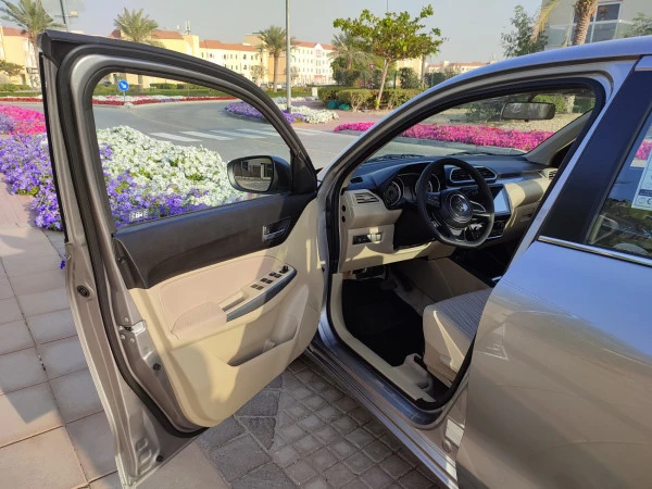  Grey Suzuki Dzire Photo 4